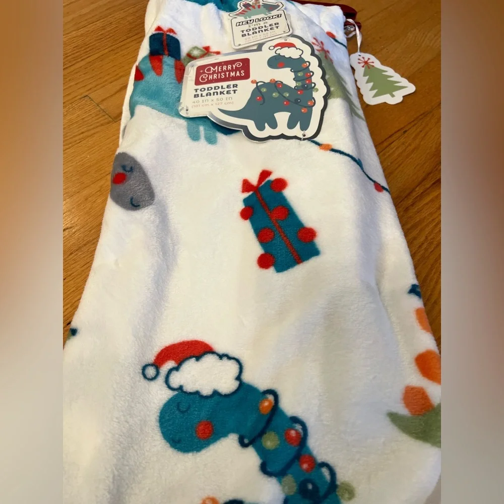 Festive dinosaur super soft blanket